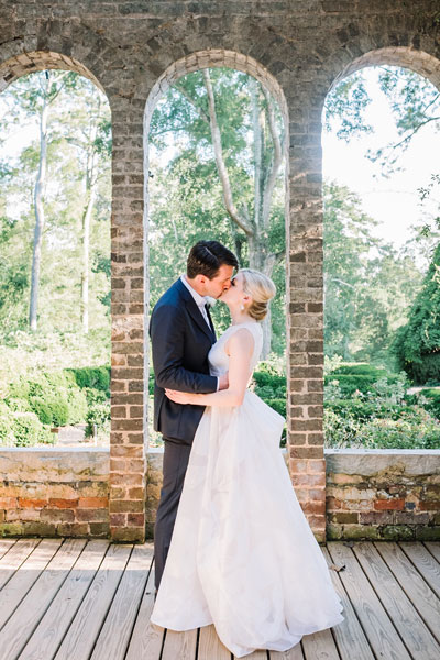 Custom Preset on Wedding Portrait of Couple under Brick Arches