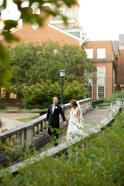 Unedited Portrait of Bride and Groom Walking on Stairs