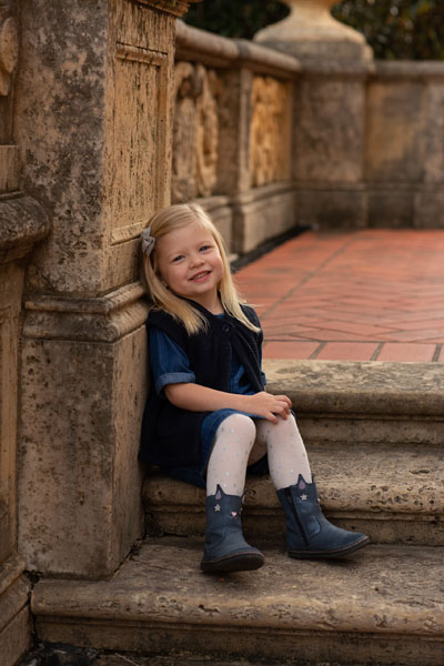 Unedited Photo of Little Girl Sitting on Steps for Portrait